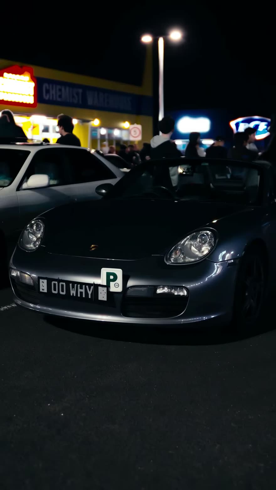Silvia at a night car meet under carpark lights